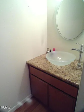 a view of house with outdoor space and seating area