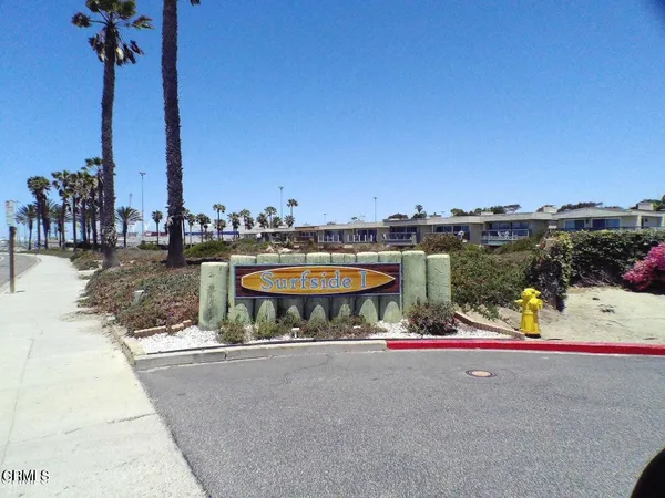 a view of swimming pool with seating space and trampoline
