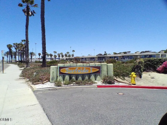 a view of swimming pool with seating space and trampoline