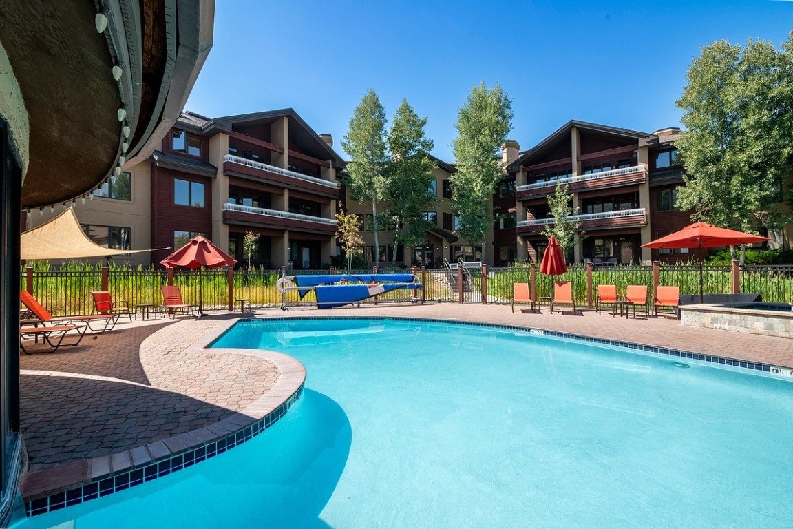 1875 Medicine Springs Road, Unit 4205 Steamboat Springs, CO 80487 - Photo 36 of 43 an outdoor space with pool and furniture