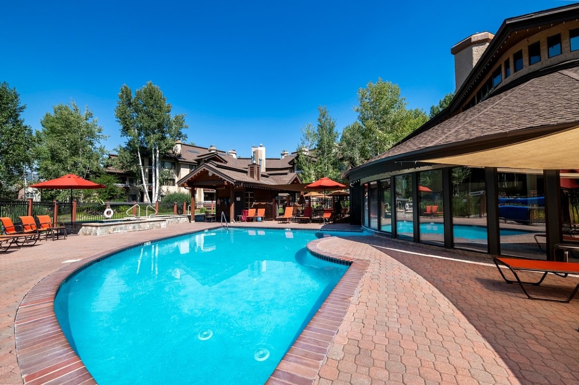 1875 Medicine Springs Road, Unit 4205 Steamboat Springs, CO 80487 - Photo 38 of 43 a view of a house with swimming pool