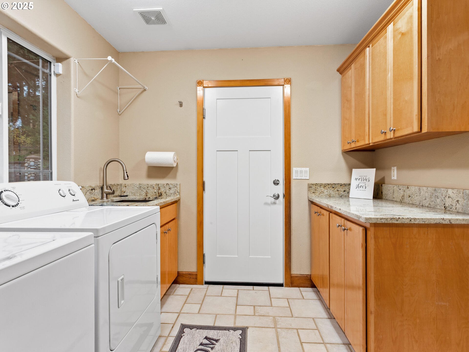 23403 Northeast Canyon Road Battle Ground, WA 98604 - Photo 18 of 48 a bathroom with a sink and a mirror