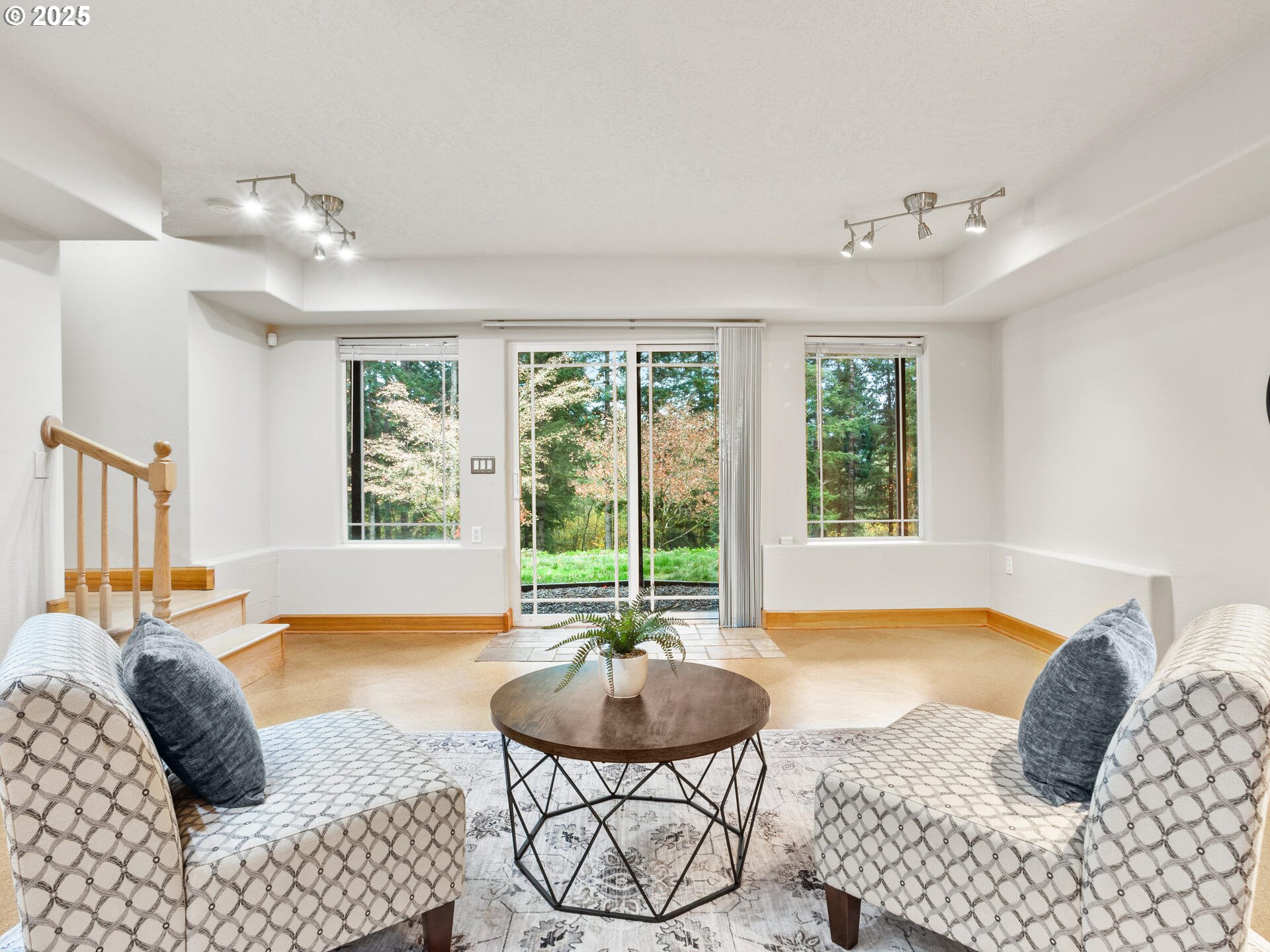 23403 Northeast Canyon Road Battle Ground, WA 98604 - Photo 19 of 48 a living room with furniture and a large window