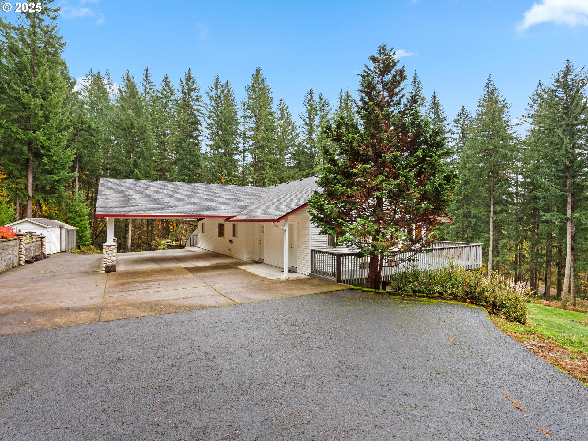 23403 Northeast Canyon Road Battle Ground, WA 98604 - Photo 2 of 48 a view of a house with a yard and sitting area