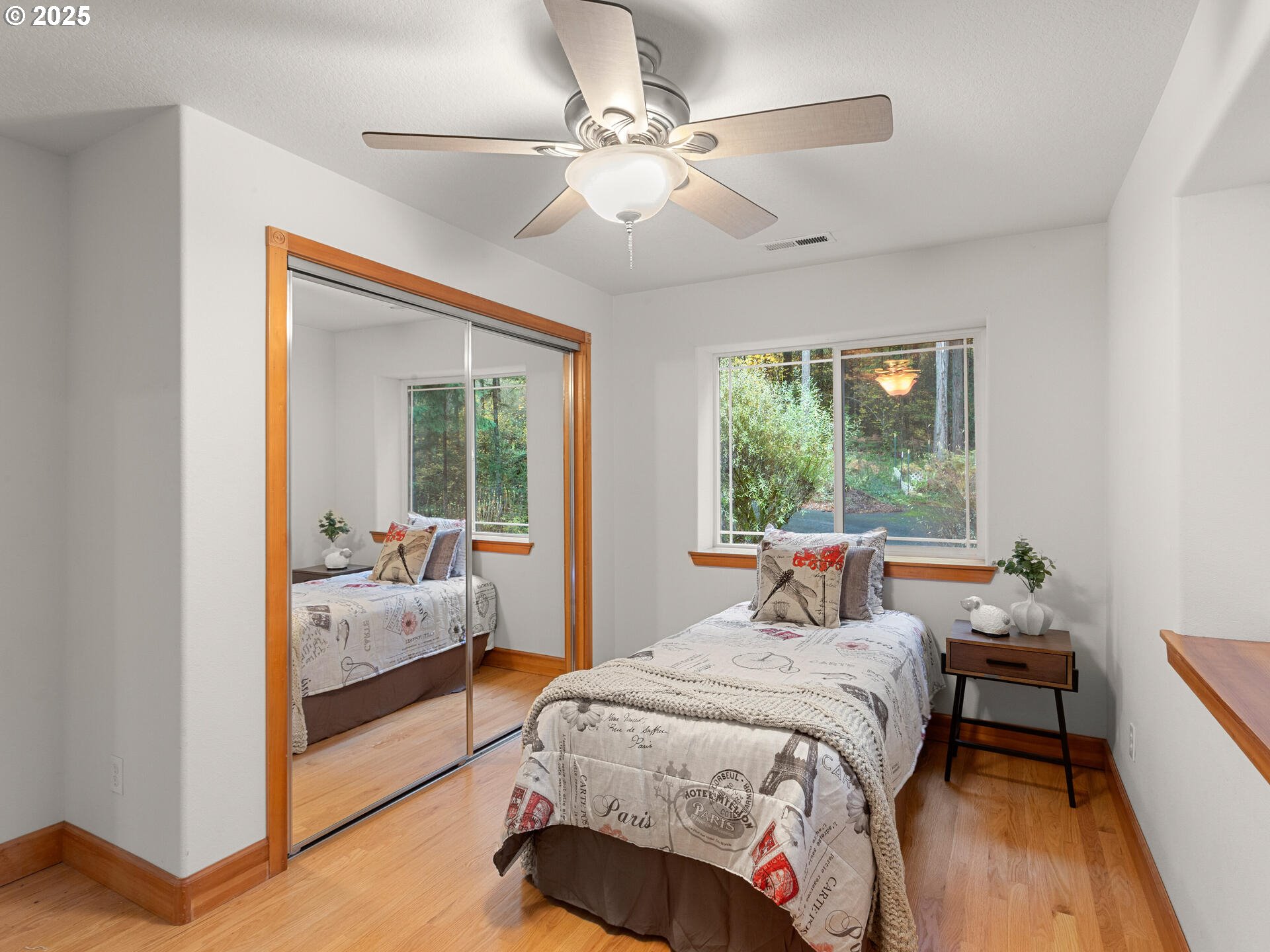 23403 Northeast Canyon Road Battle Ground, WA 98604 - Photo 34 of 48 a bedroom with a bed and a window