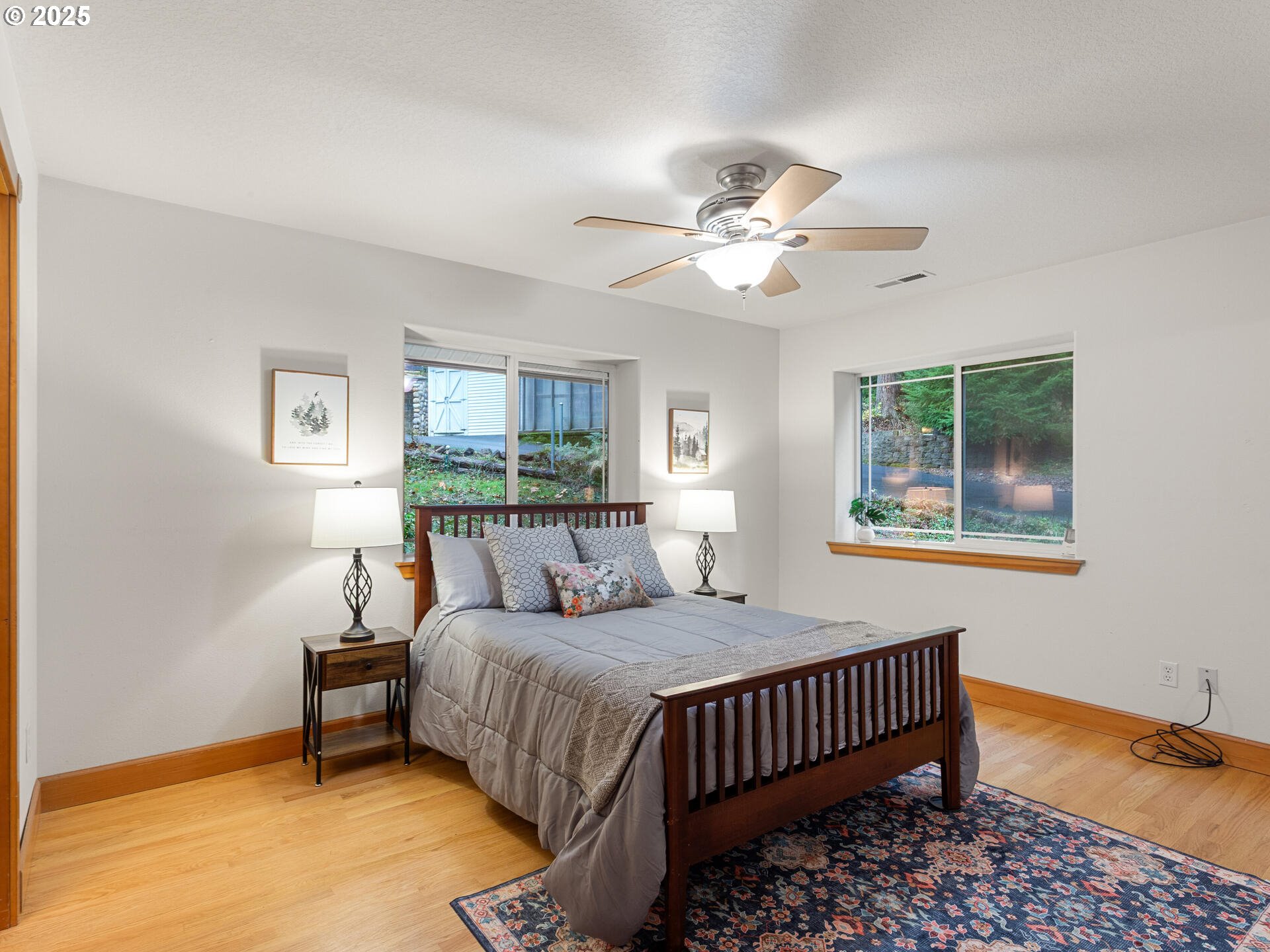 23403 Northeast Canyon Road Battle Ground, WA 98604 - Photo 35 of 48 a bedroom with a bed and a window