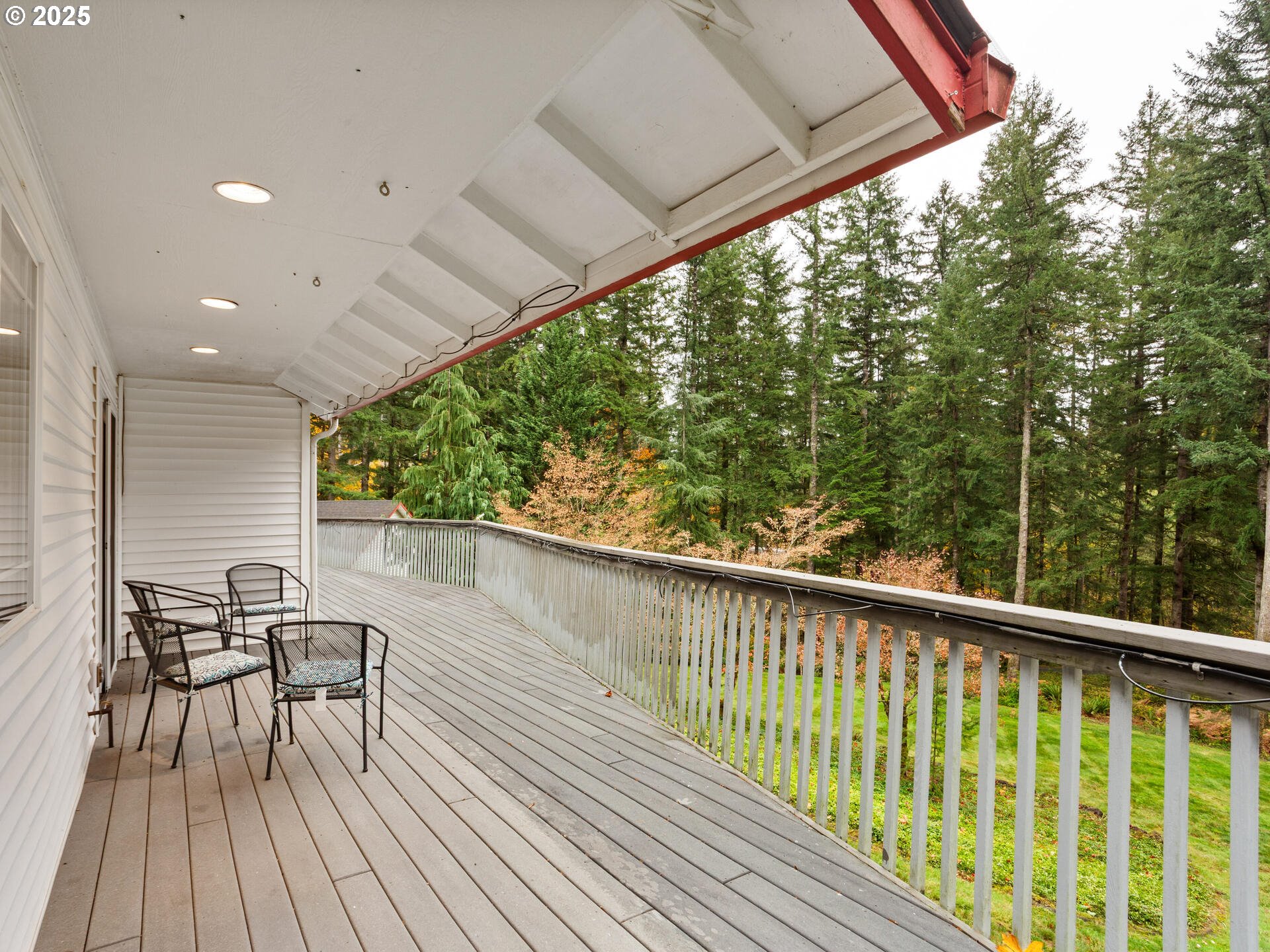 23403 Northeast Canyon Road Battle Ground, WA 98604 - Photo 10 of 48 a view of a balcony with chairs