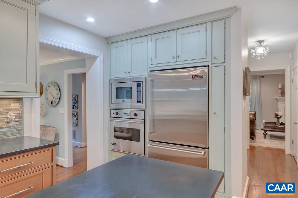 202 Sturbridge Road Charlottesville, VA 22901 - Photo 15 of 49 a kitchen with cabinets and a refrigerator