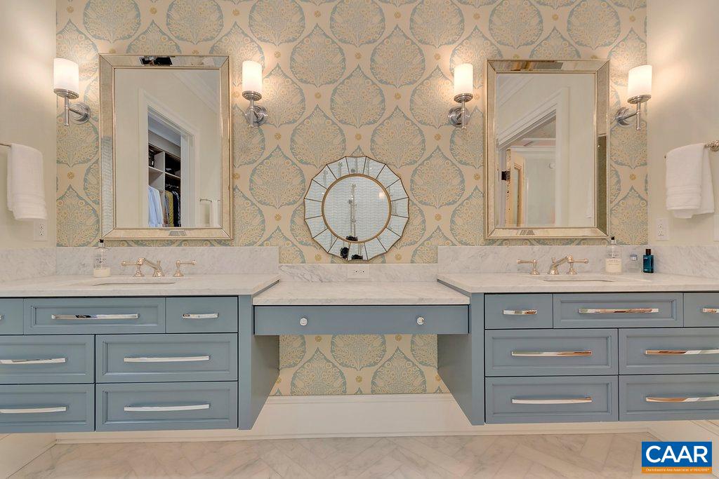 202 Sturbridge Road Charlottesville, VA 22901 - Photo 27 of 49 a bathroom with a sink vanity and a mirror