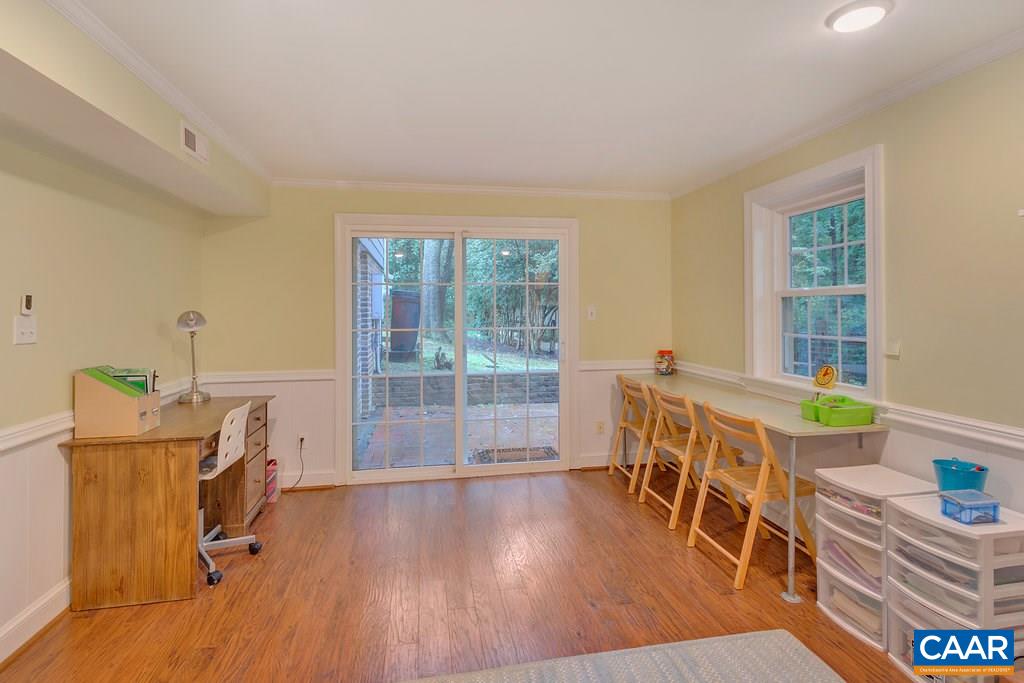202 Sturbridge Road Charlottesville, VA 22901 - Photo 44 of 49 a dining room with furniture and wooden floor