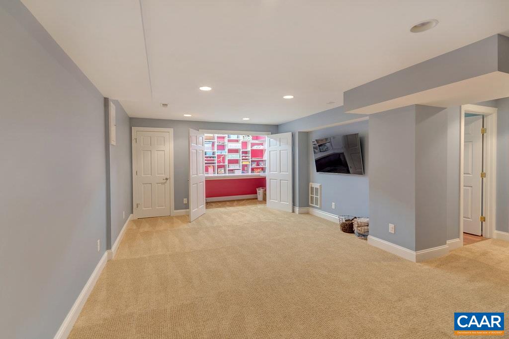 202 Sturbridge Road Charlottesville, VA 22901 - Photo 45 of 49 a view of a livingroom with a flat screen tv