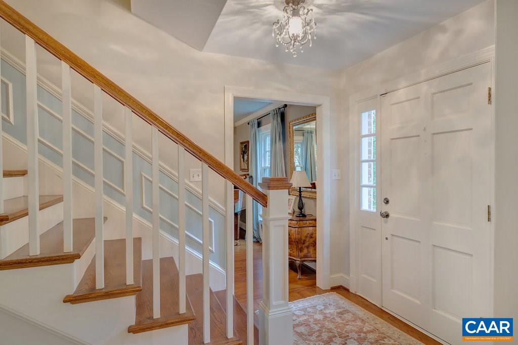 202 Sturbridge Road Charlottesville, VA 22901 - Photo 6 of 49 a view of a hallway with entryway and chandelier