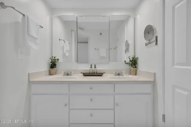 a view of a lake with a building in the background