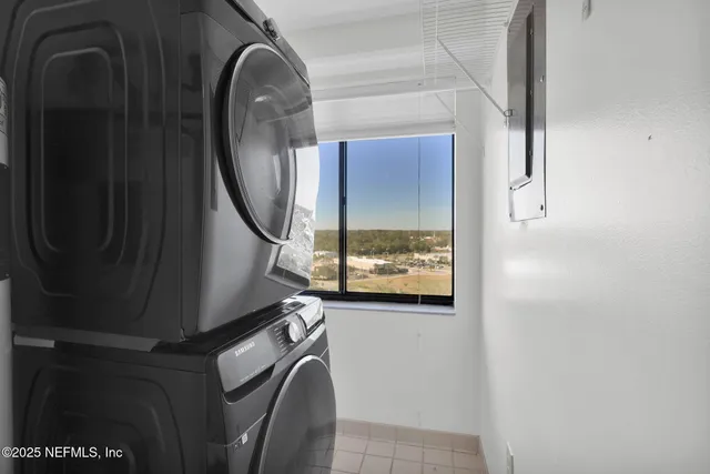 a view of a lake with a building in the background