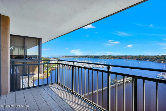 a view of swimming pool with outdoor seating and yard in the back