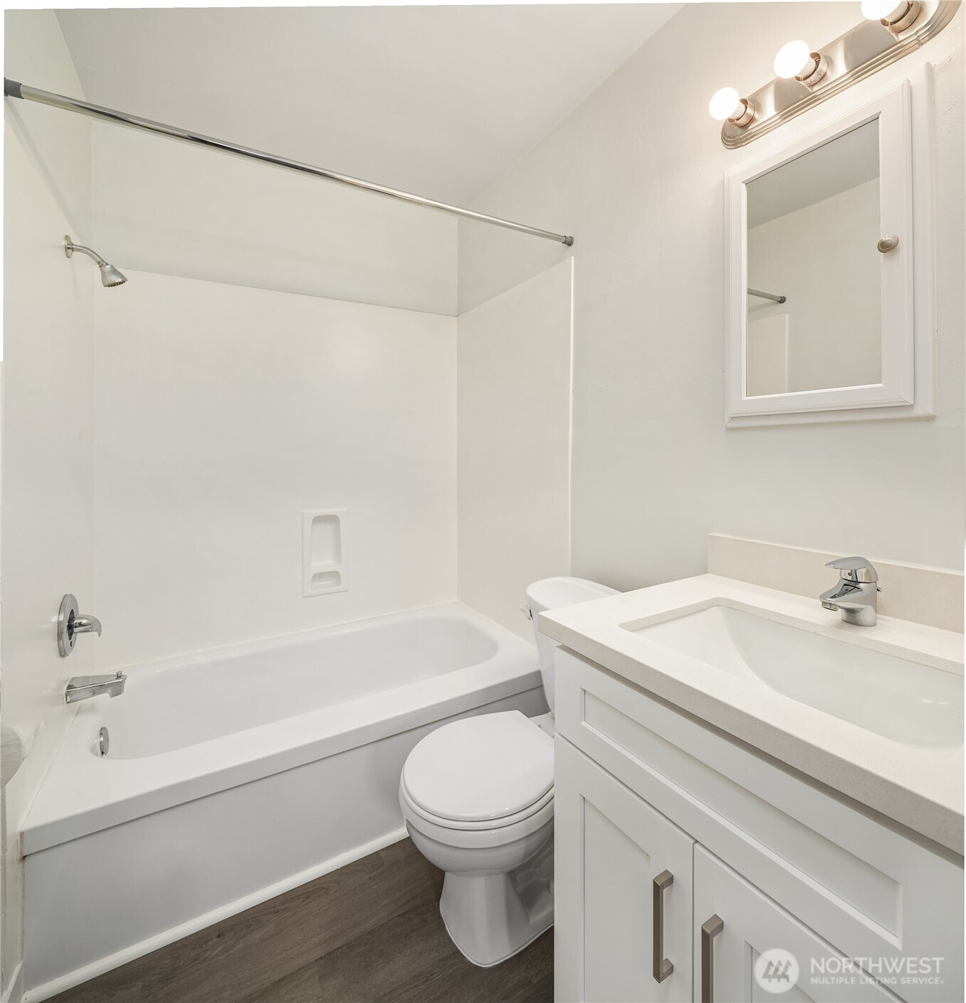 420 107th Place Southwest, Unit 1 Everett, WA 98204 - Photo 6 of 15 a bathroom with a sink a toilet and a bathtub
