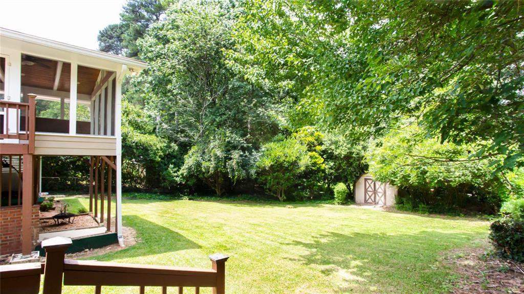 2814 Goodfellows Road Tucker, GA 30084 - Photo 45 of 46 a view of a house with backyard and sitting area