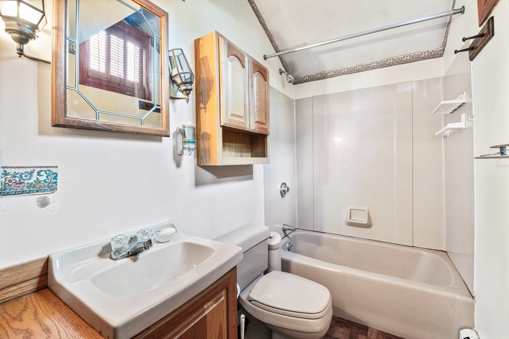 277 Appleton Street Arlington, MA 02476 - Photo 11 of 21 a bathroom with a sink a toilet and shower