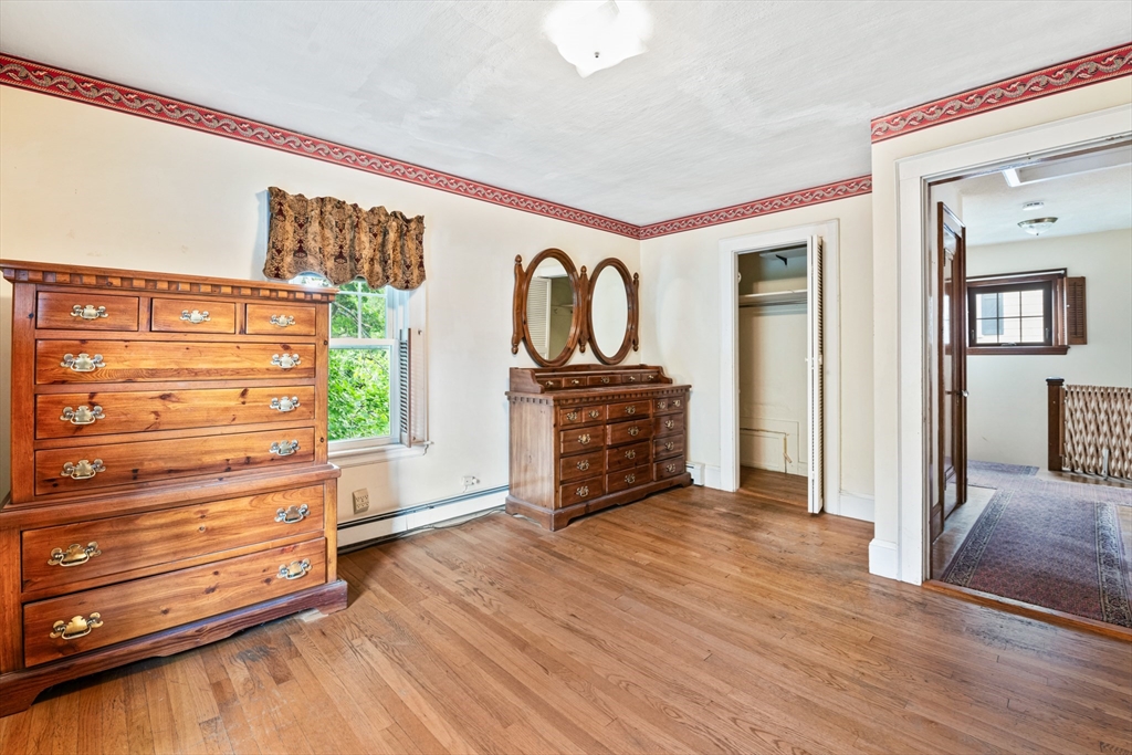 277 Appleton Street Arlington, MA 02476 - Photo 13 of 21 a view of an empty room with furniture and wooden floor