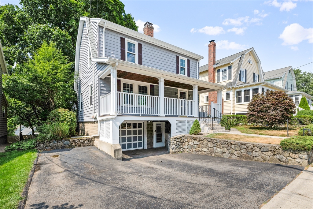 277 Appleton Street Arlington, MA 02476 - Photo 2 of 21 a front view of a building with a yard