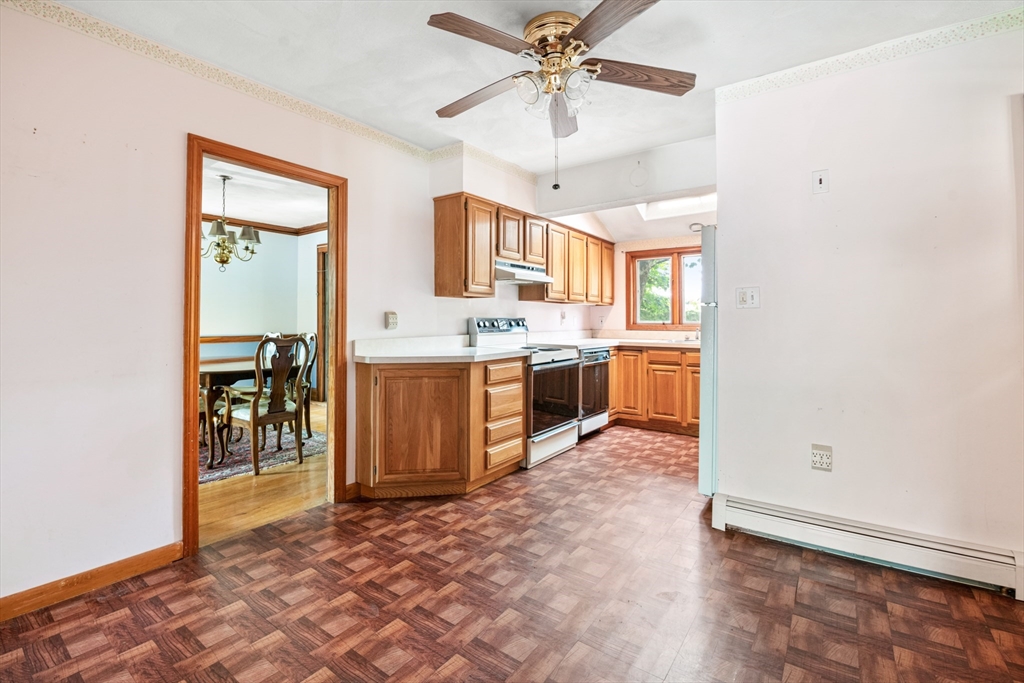 277 Appleton Street Arlington, MA 02476 - Photo 6 of 21 a view of a kitchen with a sink cabinets and a window
