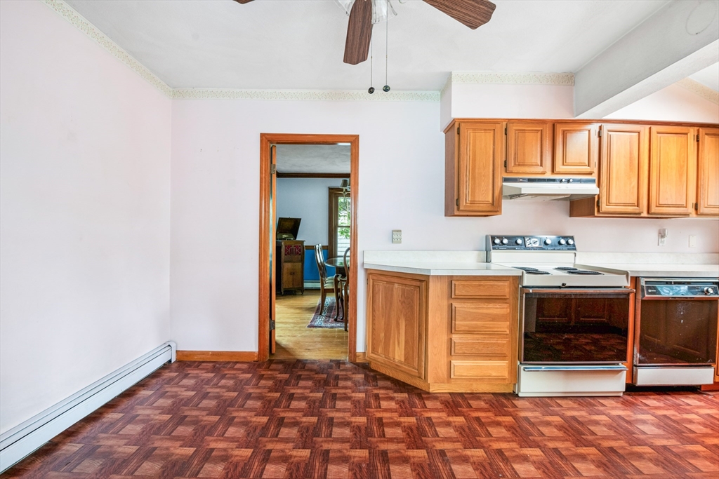 277 Appleton Street Arlington, MA 02476 - Photo 7 of 21 a view of kitchen with stainless steel appliances granite countertop a stove and a sink