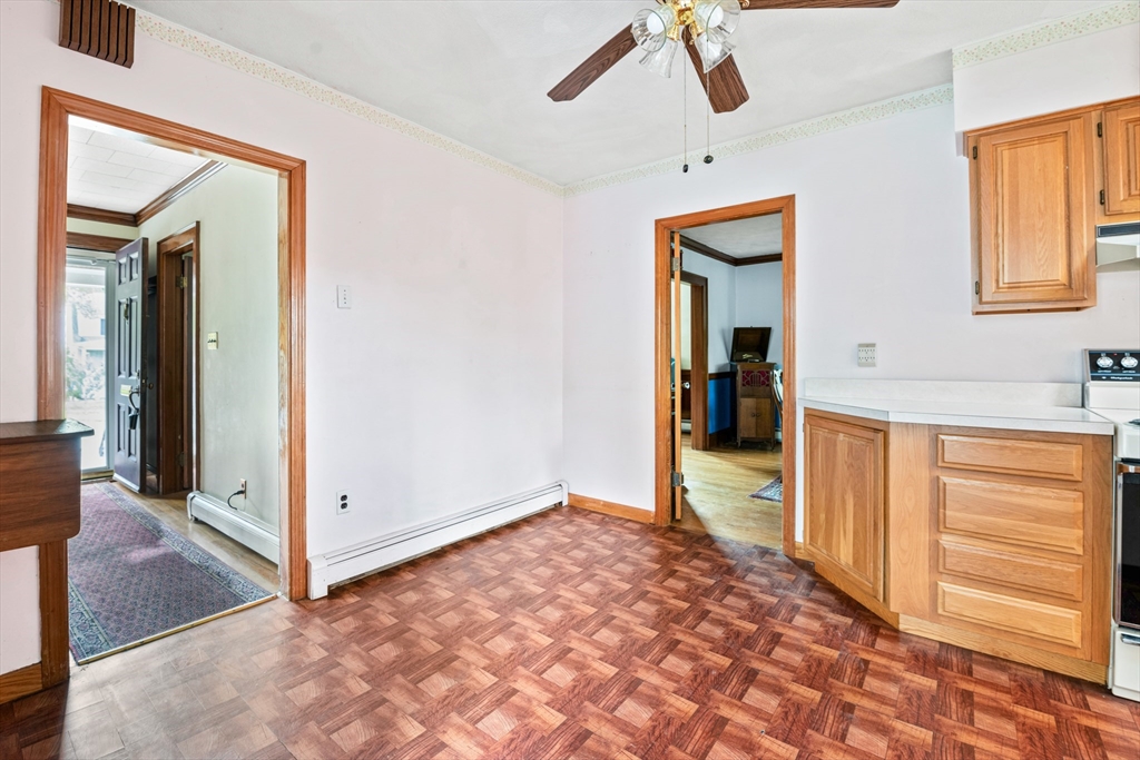 277 Appleton Street Arlington, MA 02476 - Photo 10 of 21 a view of a hallway view with wooden floor and staircase