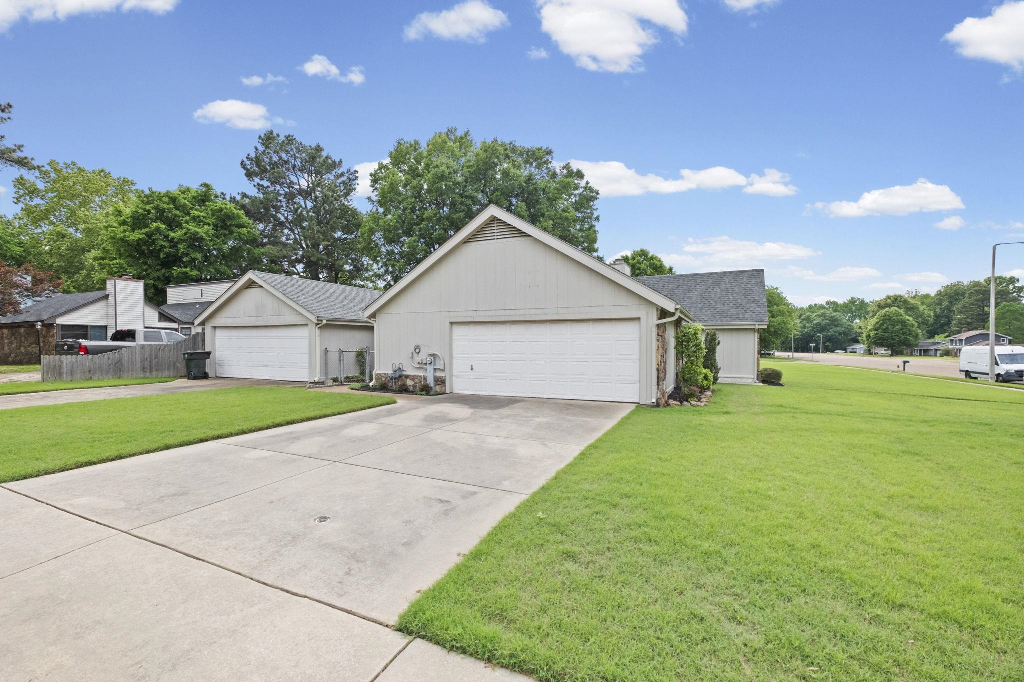 5609 Elmore Road Bartlett, TN 38134 - Photo 24 of 29 2 Car Attached and separate 3 Car Attached Garage that is heated and cooled and his it's own separate driveway.