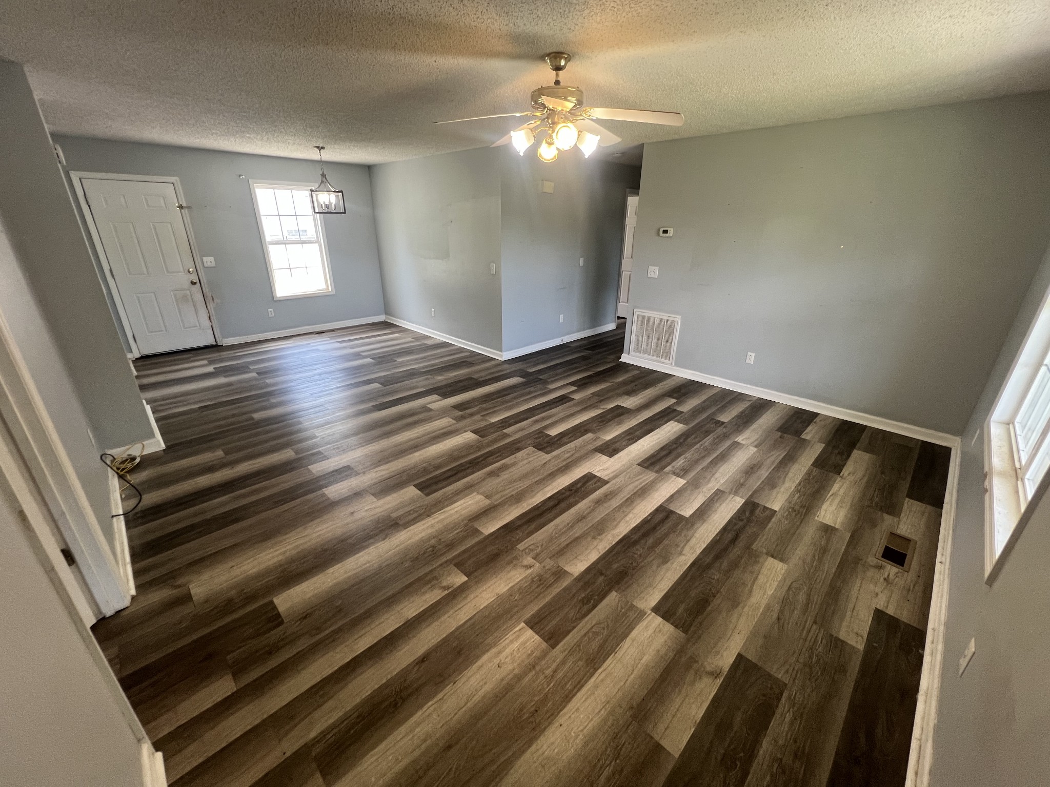 149 Hawthorne Street Pulaski, TN 38478 - Photo 4 of 33 wooden floor in an empty room
