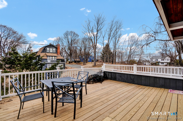 11 Winthrop Road, Unit B West Hartford, CT 06110 - Photo 17 of 27 a view of balcony with deck wooden floor and outdoor seating
