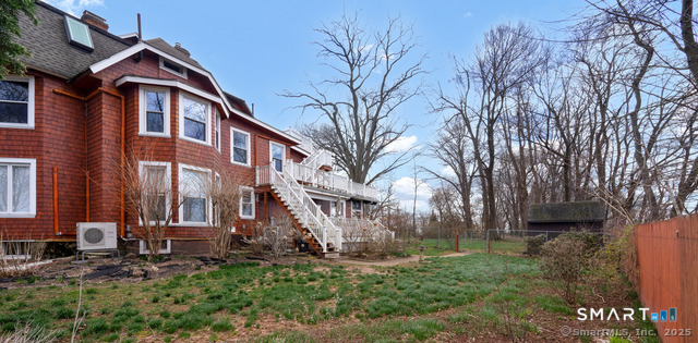 11 Winthrop Road, Unit B West Hartford, CT 06110 - Photo 20 of 27 a view of a house with a yard