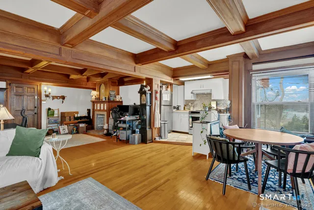 a view of a dining room with furniture window and outside view