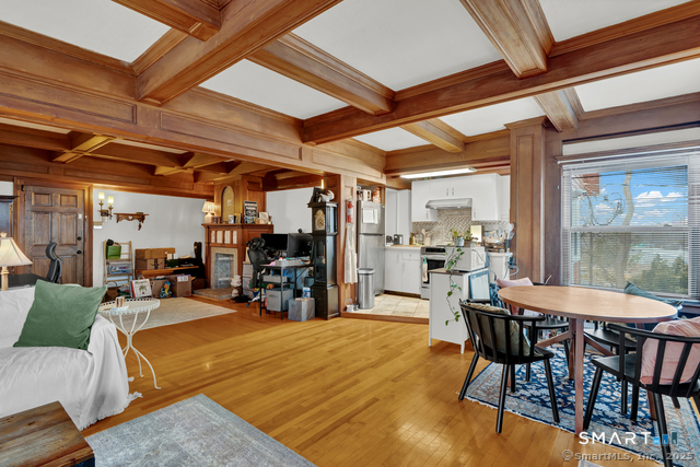 11 Winthrop Road, Unit B West Hartford, CT 06110 - Photo 2 of 27 a view of a dining room with furniture window and outside view