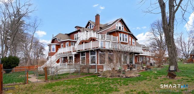 11 Winthrop Road, Unit B West Hartford, CT 06110 - Photo 24 of 27 a front view of a house with garden