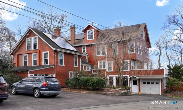 11 Winthrop Road, Unit B West Hartford, CT 06110 - Photo 26 of 27 a car parked in front of a building