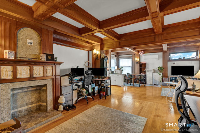 11 Winthrop Road, Unit B West Hartford, CT 06110 - Photo 4 of 27 a view of a livingroom with furniture and a fireplace