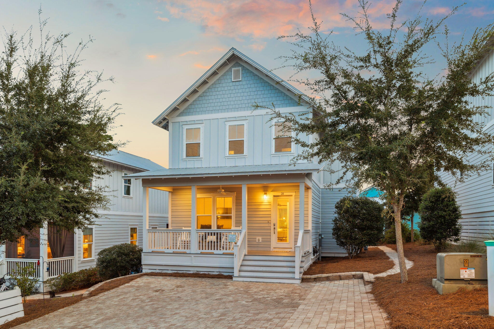 28 Emerald Beach Circle Santa Rosa Beach, FL 32459 - Photo 2 of 44 a front view of a house with a yard