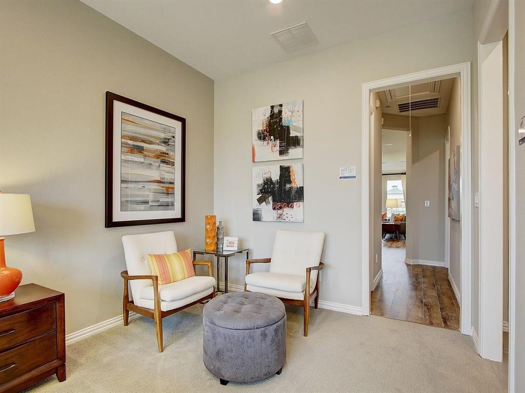 5634 Niagara Road The Colony, TX 75056 - Photo 15 of 31 a living room with furniture and a lamp