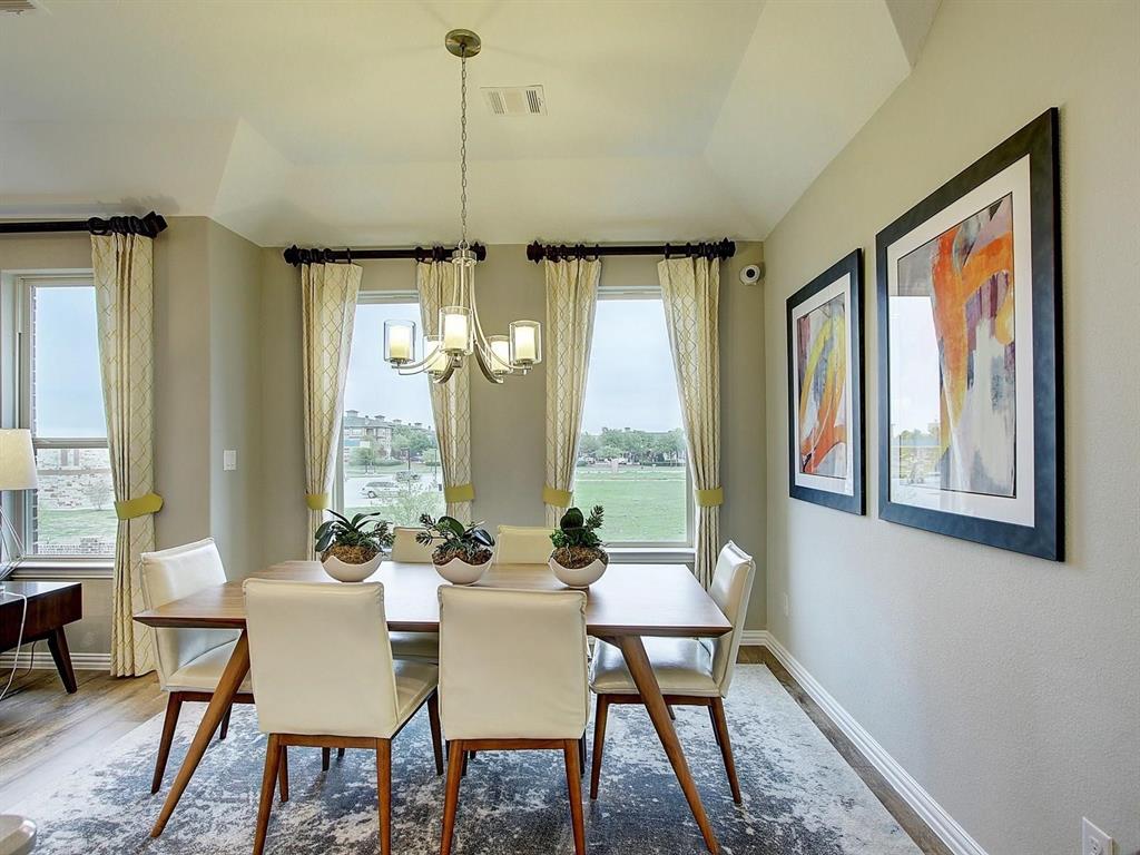 5634 Niagara Road The Colony, TX 75056 - Photo 21 of 31 a view of a dining room with furniture window and outside view