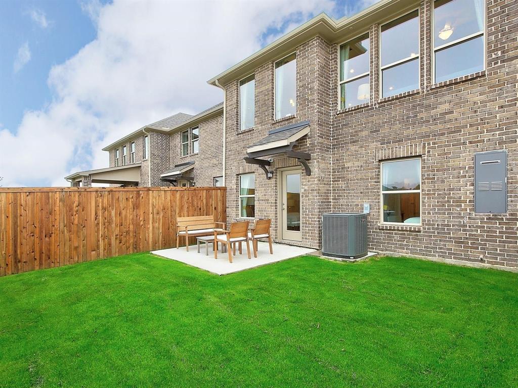 5634 Niagara Road The Colony, TX 75056 - Photo 27 of 31 a view of backyard of house with outdoor seating and green space