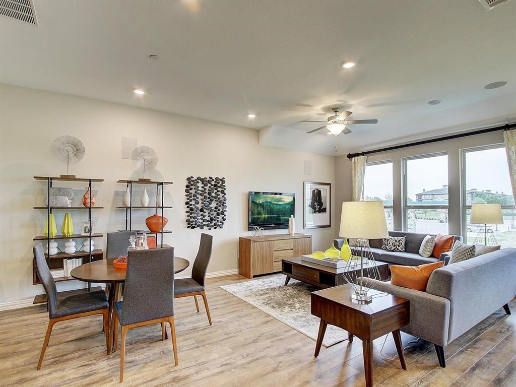5634 Niagara Road The Colony, TX 75056 - Photo 6 of 31 a living room with furniture and a large window