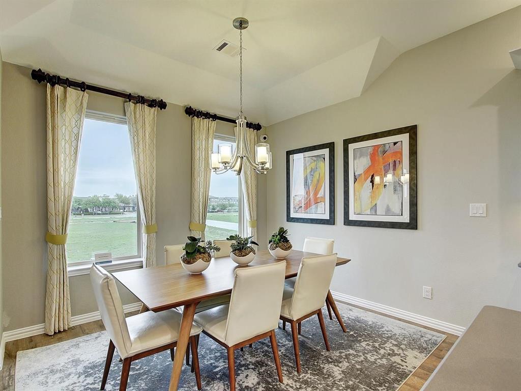 5634 Niagara Road The Colony, TX 75056 - Photo 9 of 31 a view of a dining room with furniture window and outside view