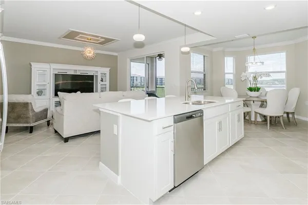 a view of living room with furniture and flat screen tv