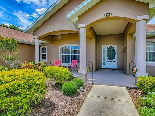a room that has a bed and a cabinet in it