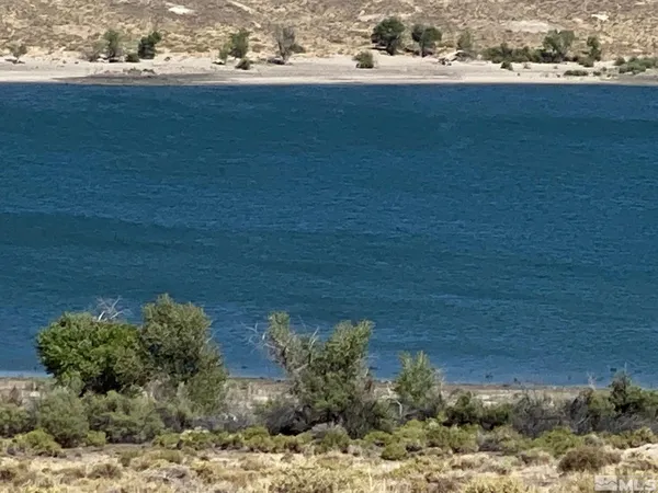 a view of a lake with beach
