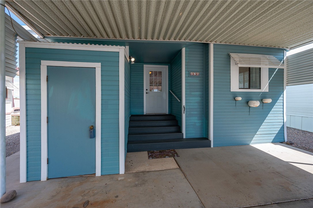 2000 Ramar Road, Unit 587 Bullhead City, AZ 86442 - Photo 10 of 79 Updated entrance to property, with exterior storage shed