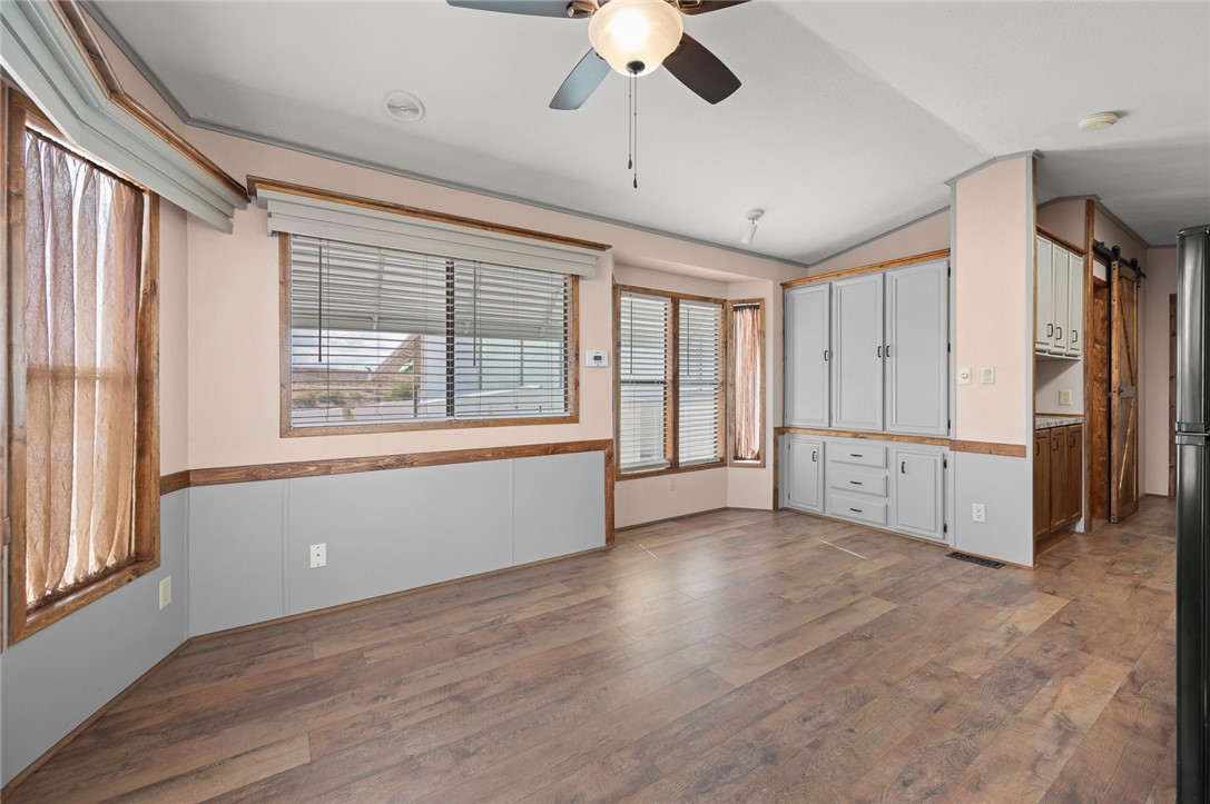 2000 Ramar Road, Unit 587 Bullhead City, AZ 86442 - Photo 19 of 79 free open dining with access to living room and kitchen