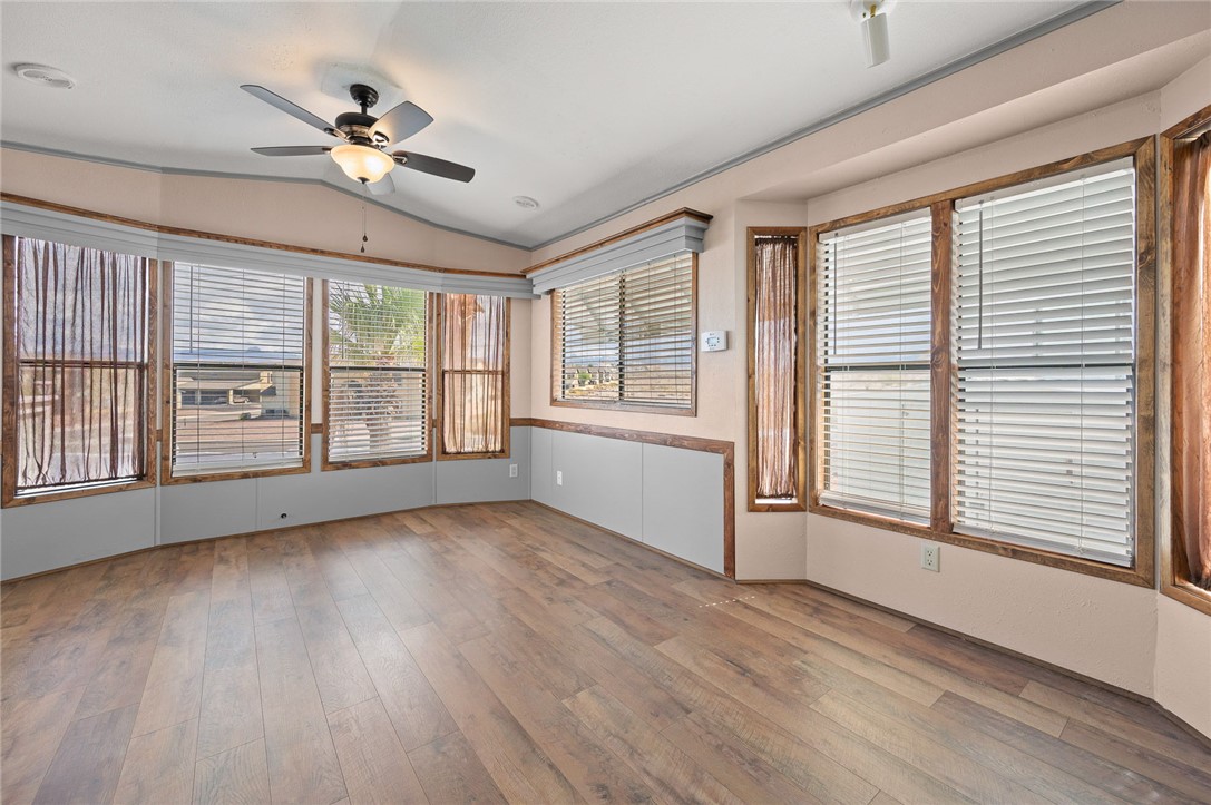2000 Ramar Road, Unit 587 Bullhead City, AZ 86442 - Photo 21 of 79 Dining area with a view and built-in storage ? perfect for displaying or keeping essentials close at hand.
