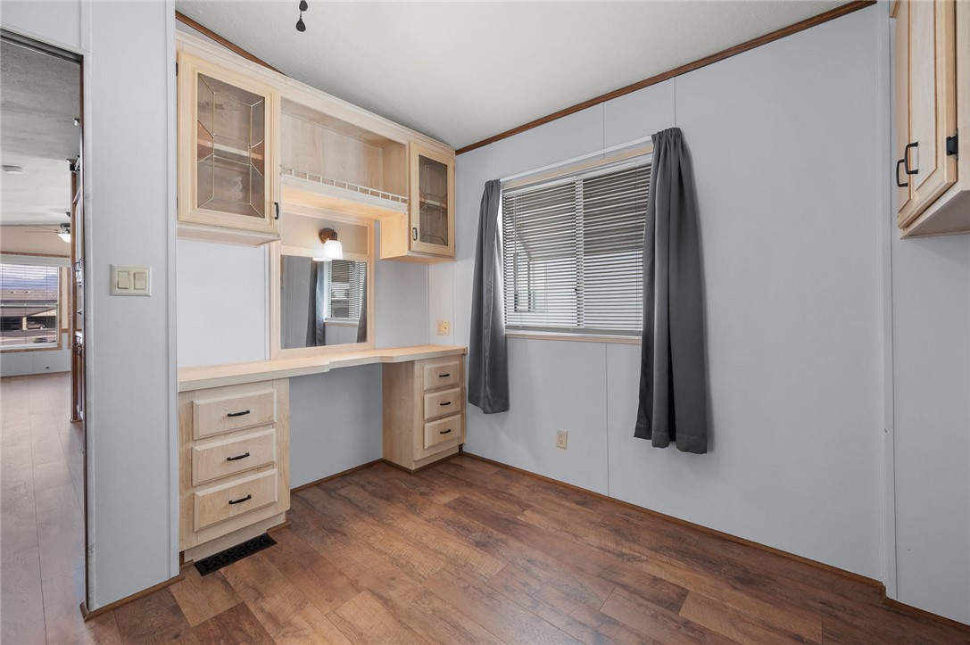 2000 Ramar Road, Unit 587 Bullhead City, AZ 86442 - Photo 38 of 79 Good size bedroom with built-in desk, storage and oversized closet