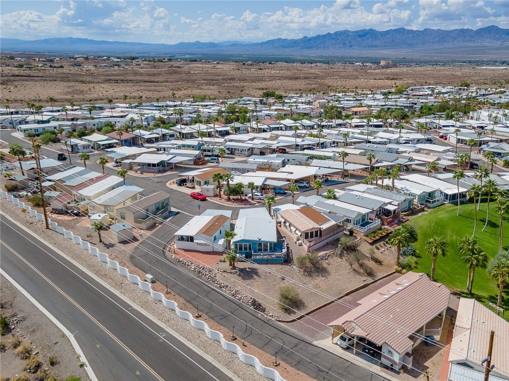 2000 Ramar Road, Unit 587 Bullhead City, AZ 86442 - Photo 57 of 79 Aerial perspective of suburban area featuring mountains